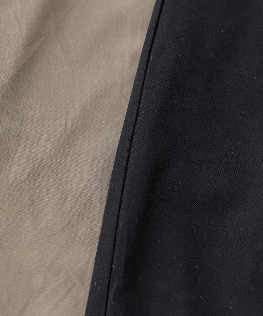 撥水カーブシルエットパンツ